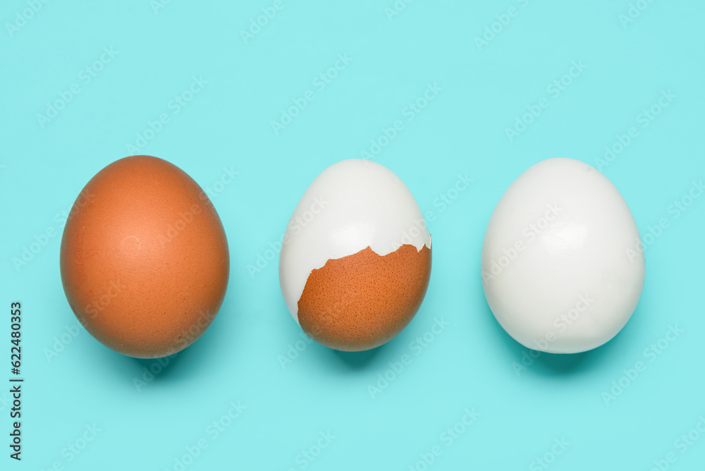 Tasty boiled eggs on blue background Tasty boiled eggs on blue background