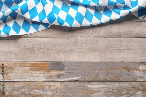 Flag of Bavaria on grey wooden background