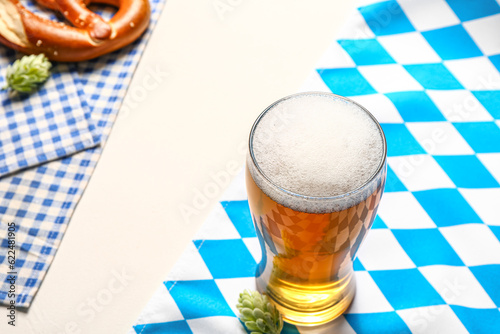 Flag of Bavaria and mug with beer on white background