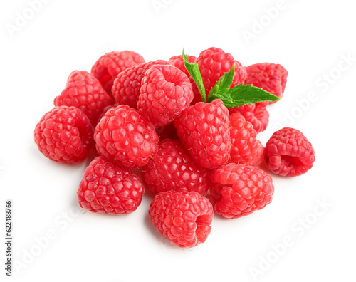 Heap of fresh raspberries and mint on white background