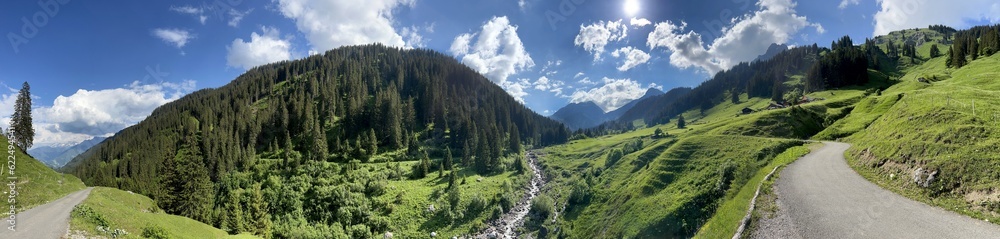 Panoramic view of the idyllic Rellstal valley (Montafon, Vorarlberg, Austria). In the background the famous Zimba peak, embedded in the impressive Rätikon mountains. Panoramic view of the idyllic Rellstal valley (Montafon, Vorarlberg, Austria). In the background the famous Zimba peak, embedded in the impressive Rätikon mountains.