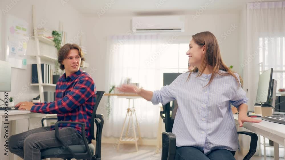Caucasian businessman and woman check sale order on computer together. Caucasian businessman and woman check sale order on computer together.