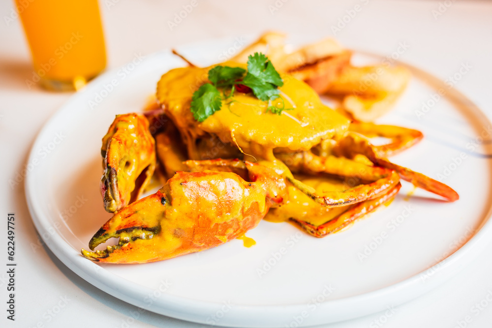 Delicious seafood on a plate, Thai curry crab Delicious seafood on a plate, Thai curry crab