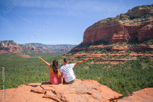 Travel in Devil's Bridge Trail, scenic view panoramic landscape in Sedona, Arizona, USA. Happy Couple on the famous trail in Sedona