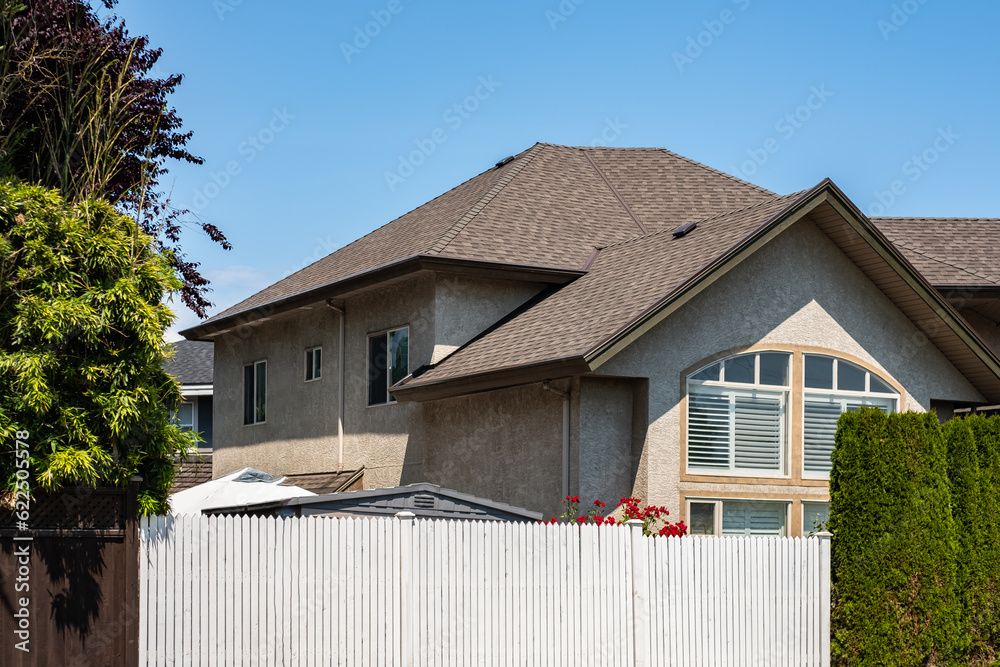Beautiful exterior house in rural suburban neighborhood. Real Estate Exterior Front House on a sunny day. Big house