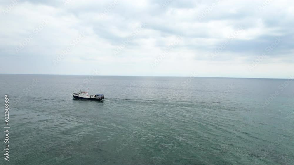 Ships with tourists sail on Lake Baikal on a summer day. Ships with tourists sail on Lake Baikal on a summer day.