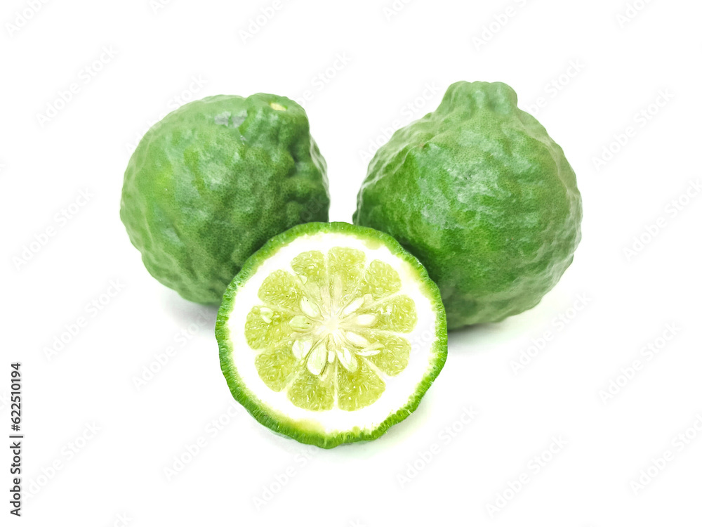 Fresh organic kaffir lime green The cut into pieces, rough skin, bergamot has many uses commonly used as a shampoo Or kaffir lime skin can be used as an ingredient in food put on a white background. Fresh organic kaffir lime green The cut into pieces, rough skin, bergamot has many uses commonly used as a shampoo Or kaffir lime skin can be used as an ingredient in food put on a white background.