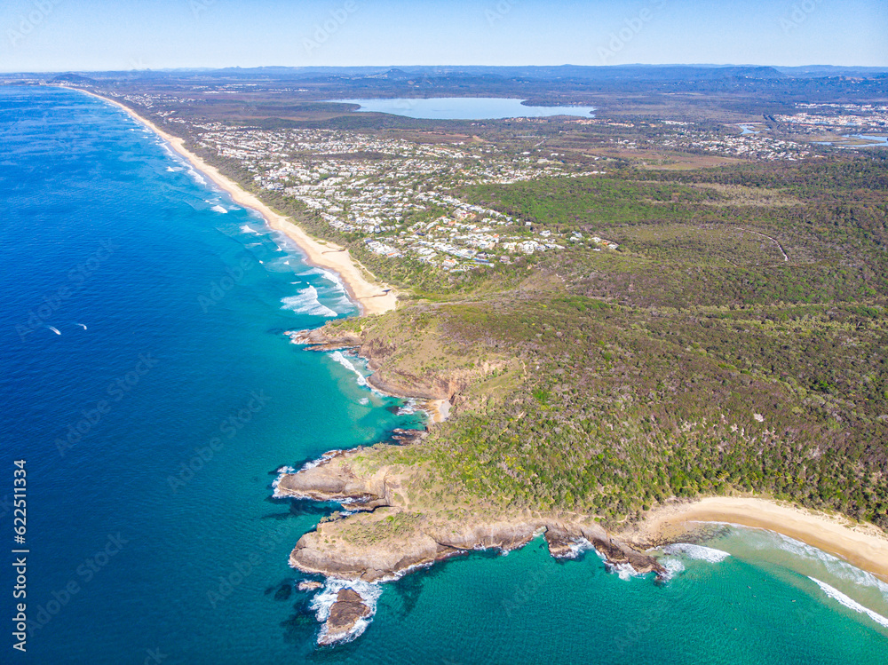 aerial panorama of beautiful coast of noosa national park; unique sandy beaches, cliffs and little bays with turquoise water near sunshine coast in south east queensland, australia	