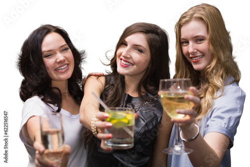 Digital png photo of caucasian female friends holding drinks and smiling on transparent background