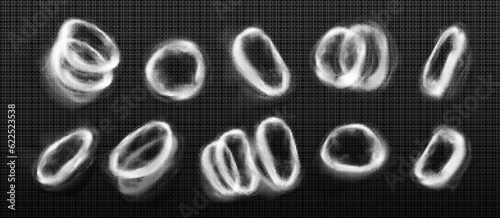 Realistic set of smoke rings isolated on transparent background. Vector cartoon illustration of steam circles, cigarette, vape, hookah vapor swirls, tornado effect, dust puff, co2 smog emission
