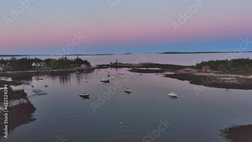 Blue hour light beyond Cape Harbor, Dynamic aerial shot tracking in  photo