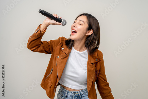 Obraz na plátne Happiness young asian woman singing song