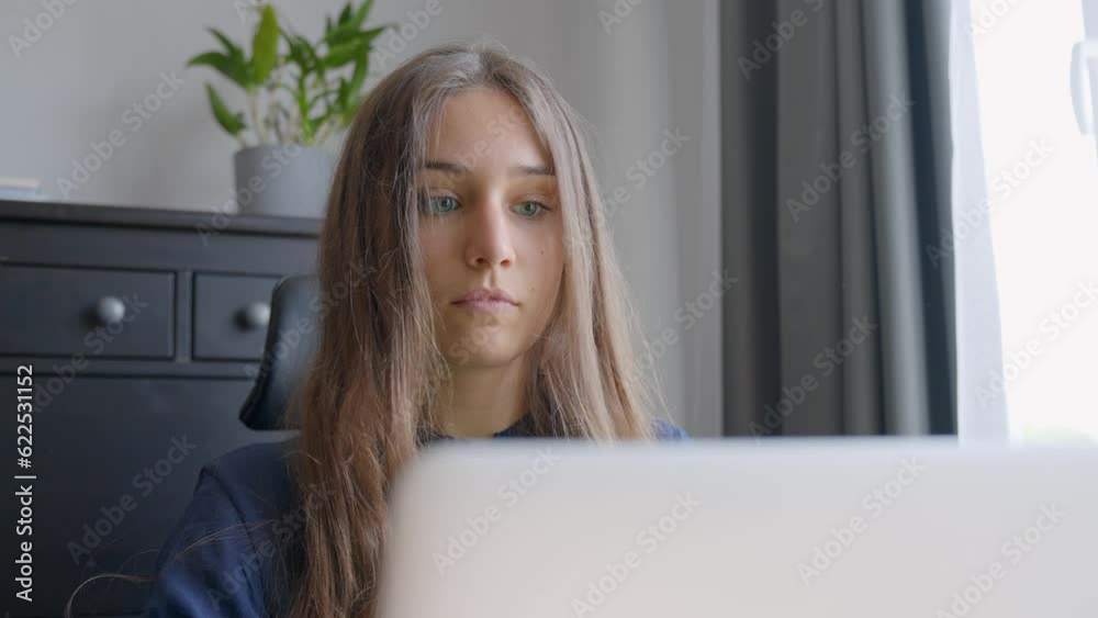 Young brunette working from home, front motion view