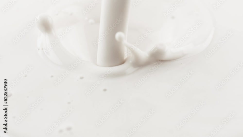 Milk pouring in slow motion Milk pouring in slow motion