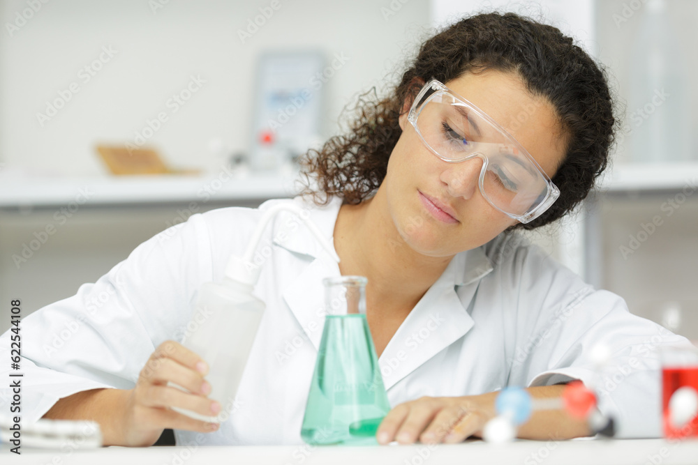 a working woman during research lab a working woman during research lab