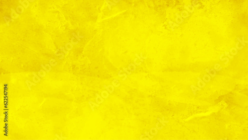 Close-up of abstract yellow concrete wall texture background. Watercolor gold marble.