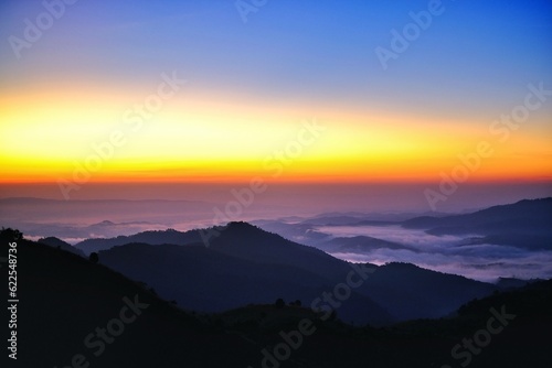 sunrise over the mountains © Surakiet