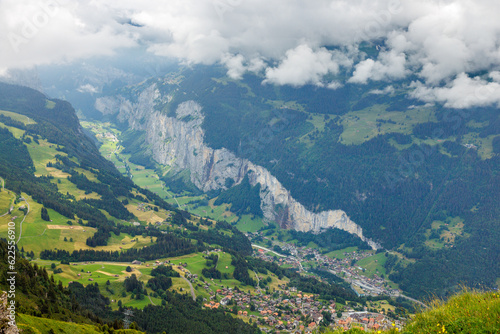 view from Männlichen through clouds into Lauterbrunnen valley