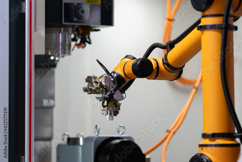 robot arm working in factory