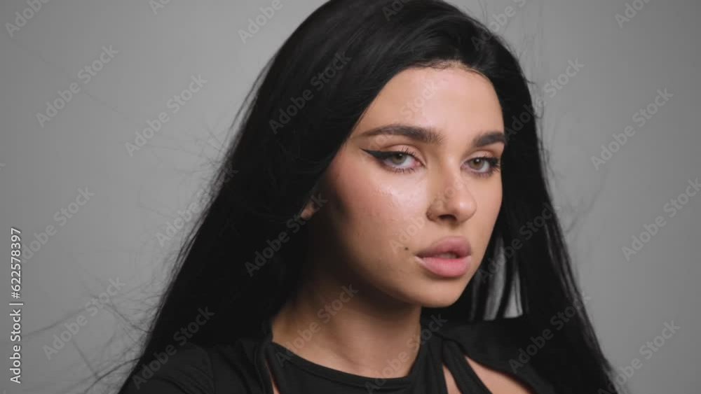 Beautiful woman in profile with long and shiny hair . Beauty model girl with black hair. Beautiful woman in profile with long and shiny hair . Beauty model girl with black hair.