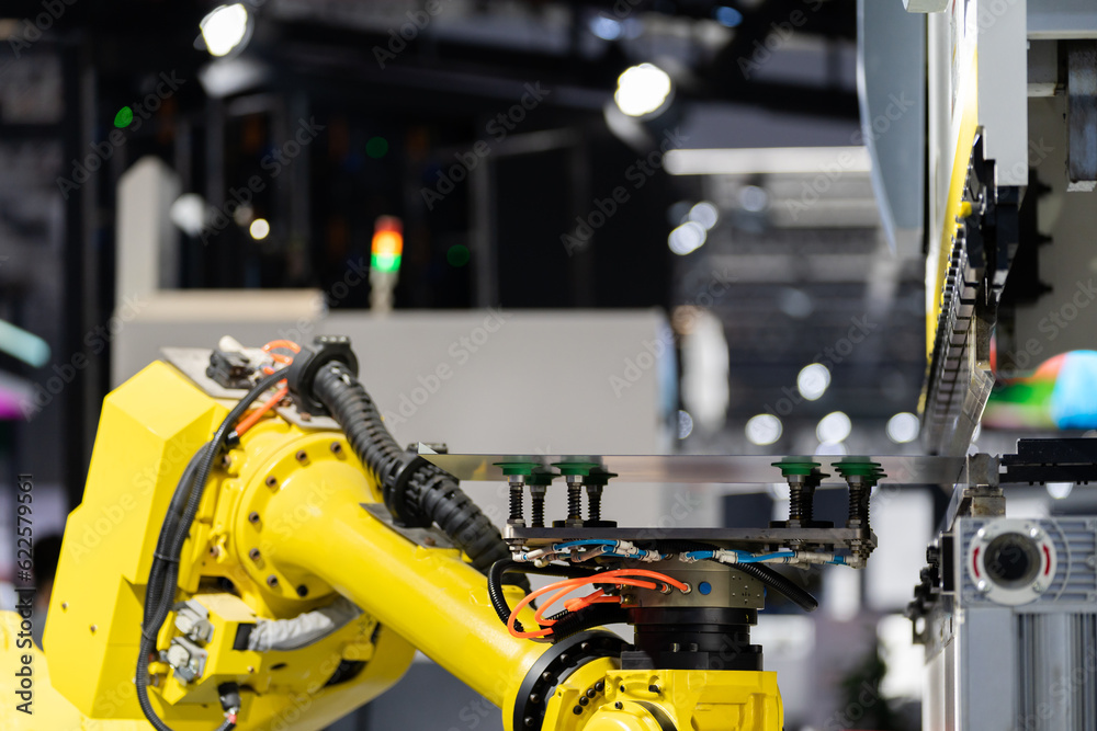 robot arm working in car factory