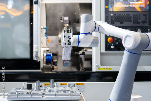 robot arm working in factory