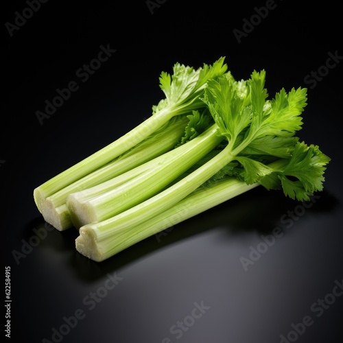 photo of celery on black background