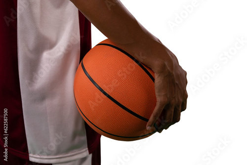 Digital png photo of biracial male basketball player with basketball on transparent background