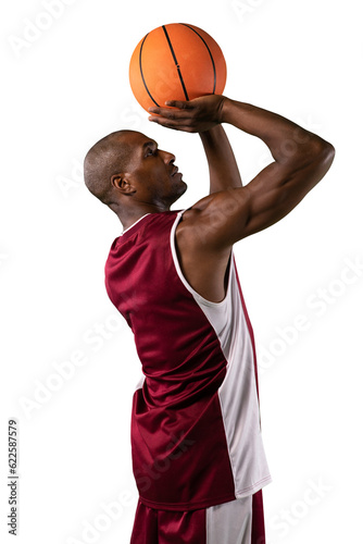 Digital png photo of african american male basketball player throwing ball on transparent background