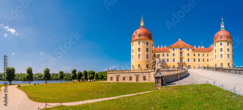 Moritzburg, Saxony, Germany - July 7, 2023: Panoramic over famous ancient Moritzburg Castle, near Dresden at sunny summer day with blue sky