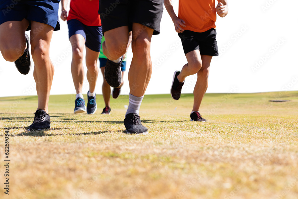 Obraz premium Digital png photo of caucasian male soccer players running at stadium on transparent background