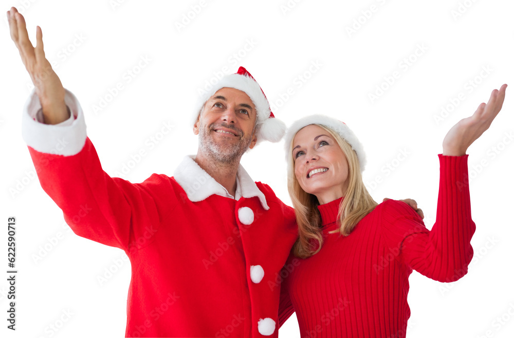 Digital png photo of happy caucasian couple in santa hat at christmas on transparent background Digital png photo of happy caucasian couple in santa hat at christmas on transparent background
