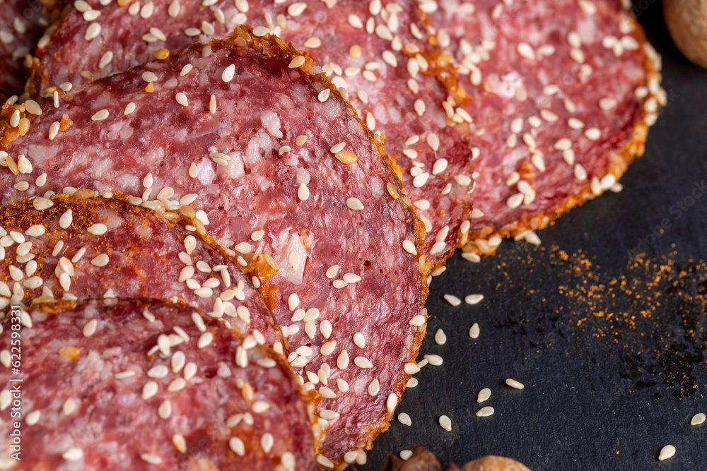 fresh sausage with sesame seeds and aromatic spices fresh sausage with sesame seeds and aromatic spices