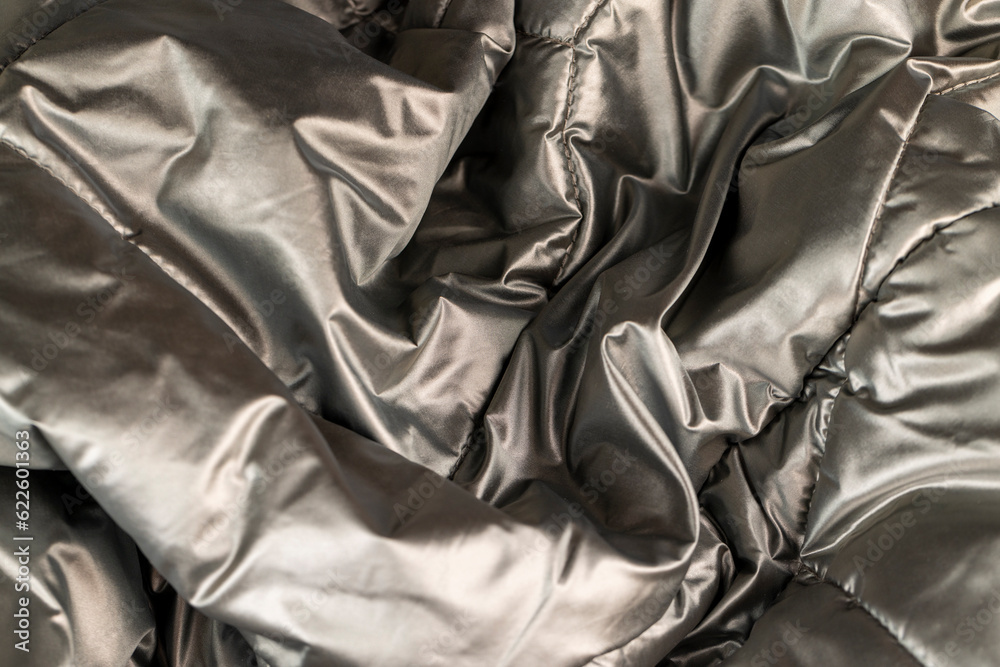 Obraz premium part of the fabric from beige-colored clothing