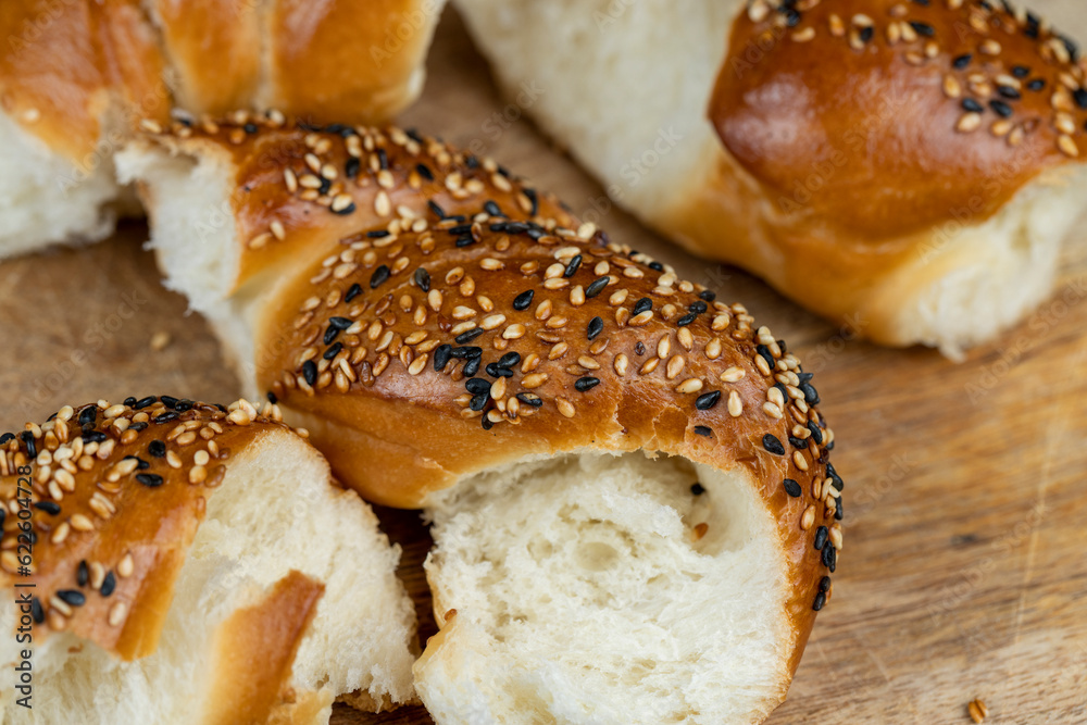 soft and fresh wheat bagel sprinkled with white and black sesame seeds