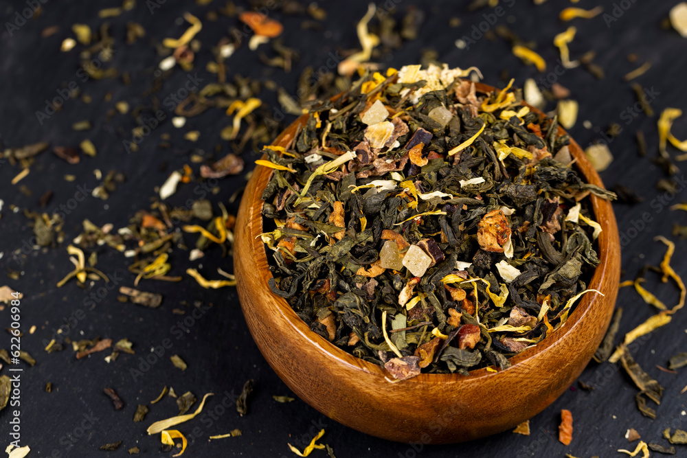 fresh green tea with pieces of fruit and berries fresh green tea with pieces of fruit and berries