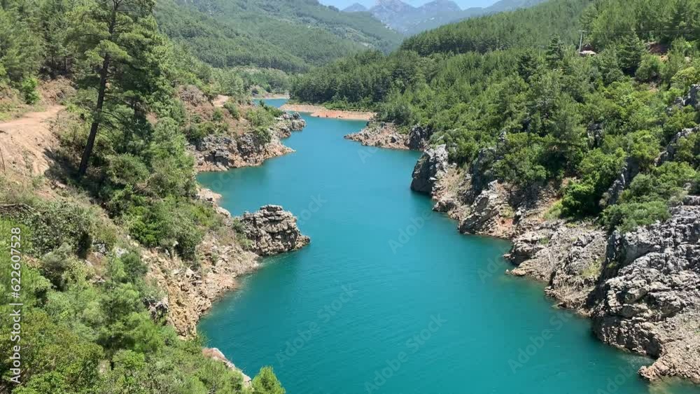 View of the blue river Dimchay in the Alanya region. Famous local place, breathtaking nature of Turkey. Dim River National Park near Alanya, Turkey. View of the blue river Dimchay in the Alanya region. Famous local place, breathtaking nature of Turkey. Dim River National Park near Alanya, Turkey.