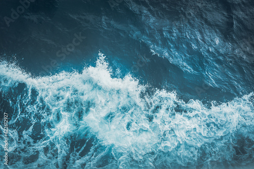 View from above turquoise ocean waves background.