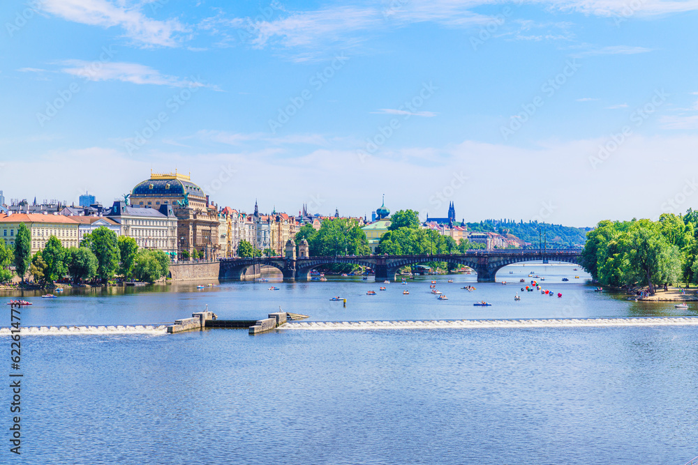 View of River Vltava in Prague, Czech Republic. People enjoy summertime using recreational boats