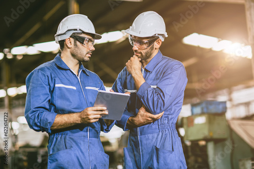 young engineer staff worker talking with senior team supervisor consult discuss about working problem