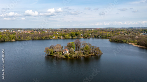 Farum, Denmark - May 04, 2022: Aerial drone view of Farum Lake and the island Klaus Nars Holm.