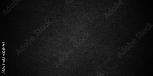 Black stone wall texture grunge rock surface. dark gray background backdrop. wide panoramic banner. old wall stone for dark black distressed grunge background wallpaper rough concrete wall.