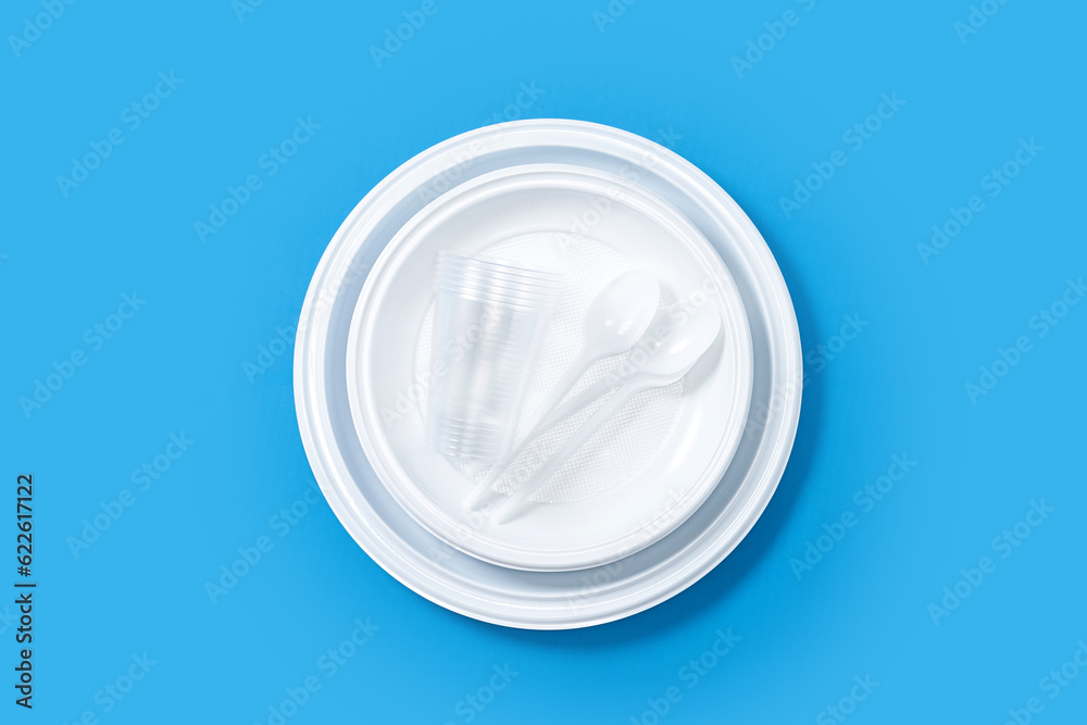 Disposable waste plastic pattern on blue background. Copy space Disposable waste plastic pattern on blue background. Copy space