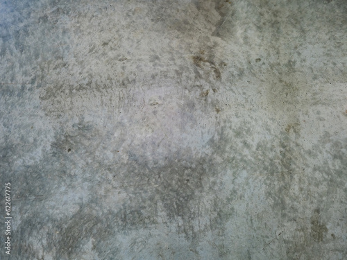 Shabby concrete wall. Grunge background. Texture of concrete wall. Shabby stone surface. Grunge pattern. Background from dirty concrete wall. Fragment of stone floor close-up. Backdrop, wallpapers