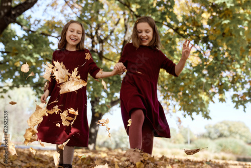 Caucasian child siblings having fun in the woods © gpointstudio