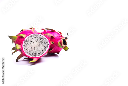 Delicious cut and whole dragon fruits (pitahaya) isolated on white background with copy space