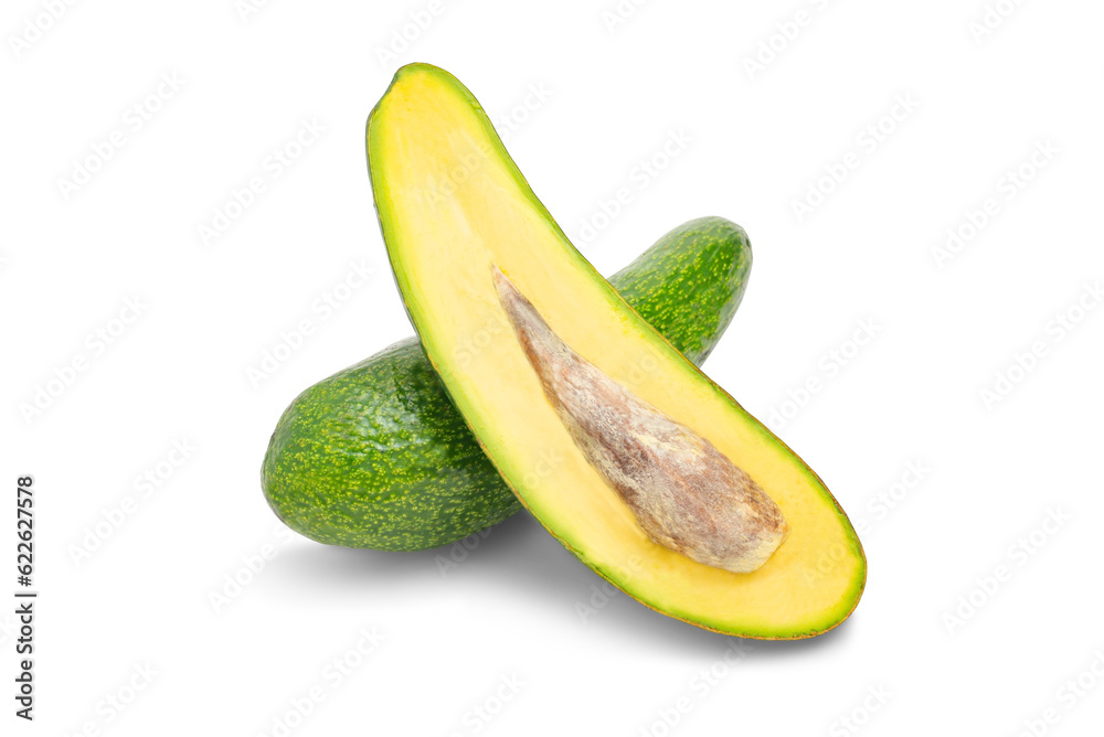 Half of fresh avocado isolated on white background. Ripe fresh green avocado with Clipping Path. collection Avocado studio macro shooting. Whole and half avocado, close-up. Exotic fruit as diet food