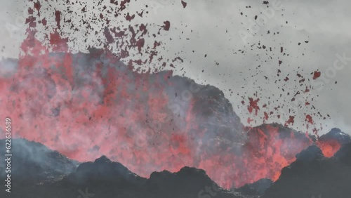 Close up drone shot of lava spewing from crater in eruption in Iceland 2023
