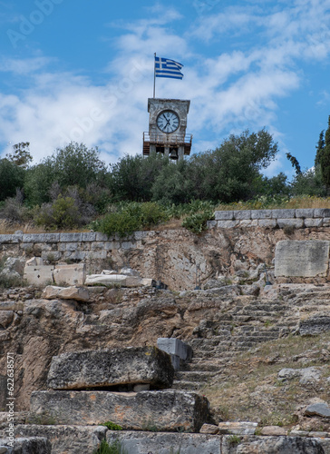 Elefsina Clock Tower at highest point over Archaeological Site, monument Attica Greece. Vertical photo