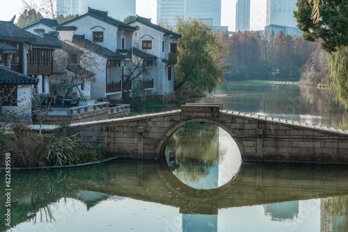 Old bridge of an ancient town in the city photo